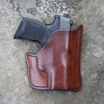 Taschenholster aus braunem Leder