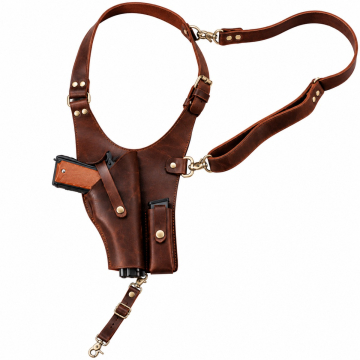 Vintage brown leather shoulder holster with matching magazine pouch and adjustable harness