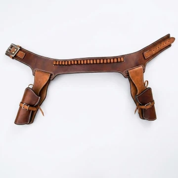 Brauner Western-Ledergürtel mit zwei Revolverholstern und Patronenschlaufen