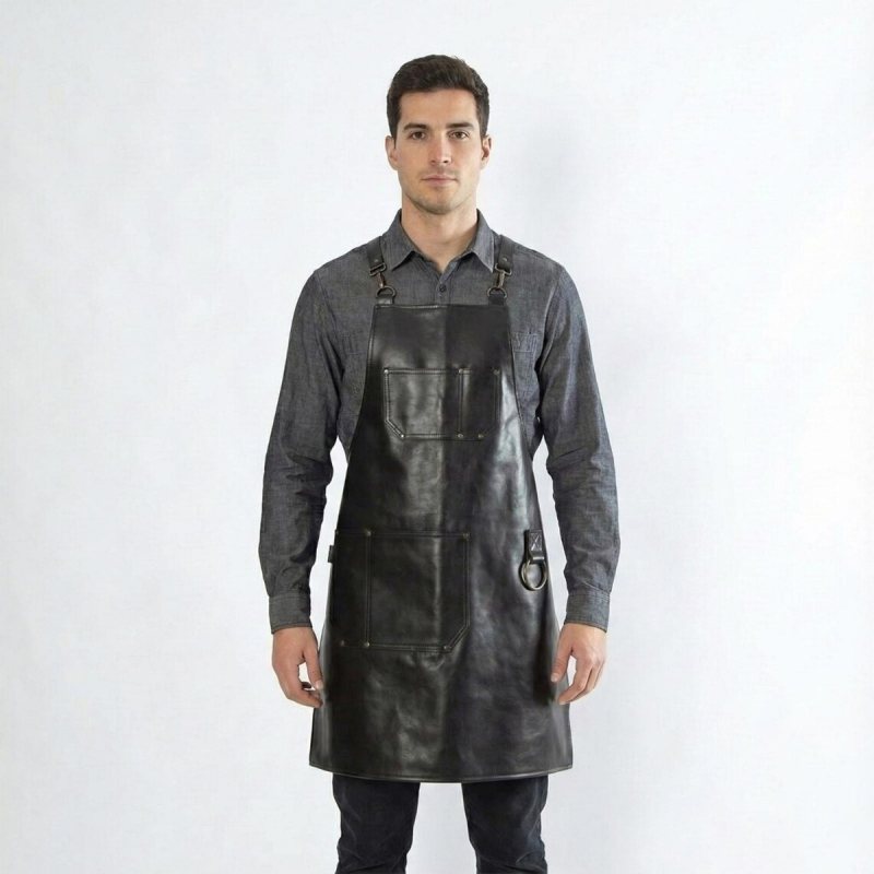 Front view of black leather bartender work apron worn by model