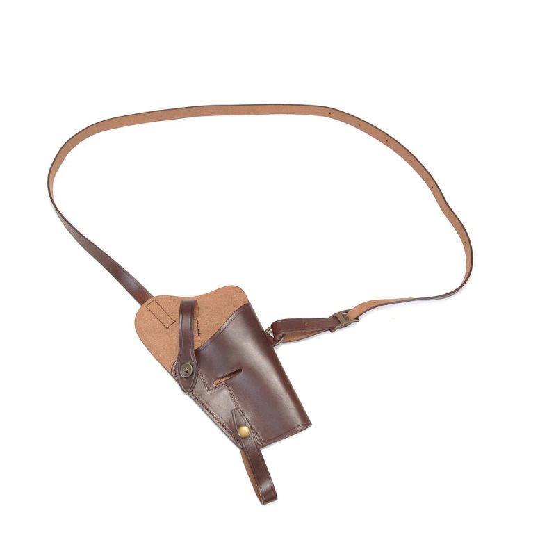 Brown leather military shoulder holster laid flat showing full strap layout