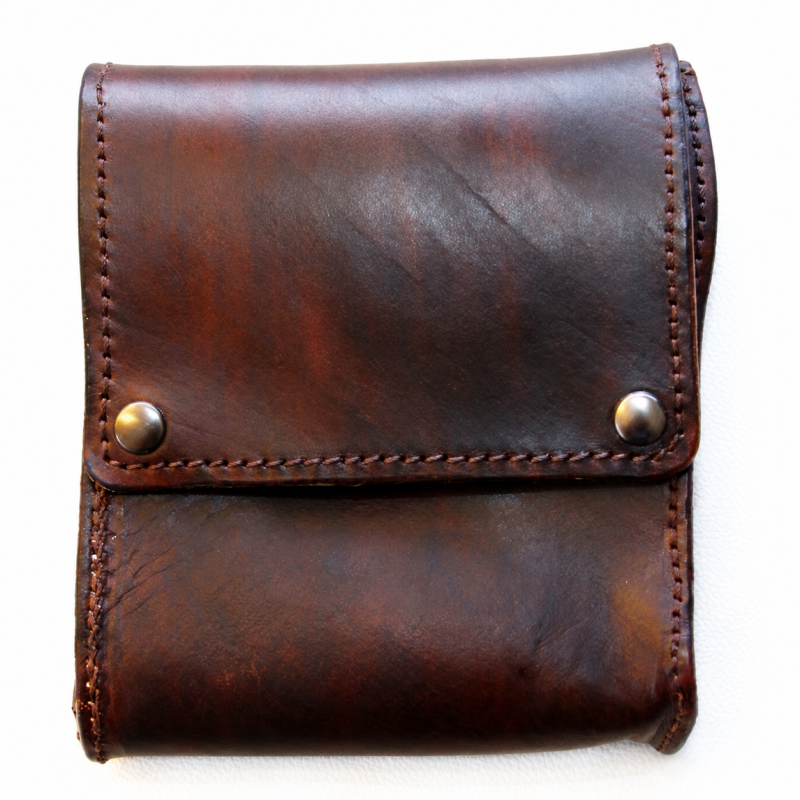 Closed leather belt-case holster front without maker wordmark