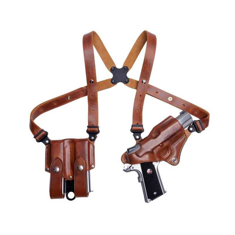 Heritage leather shoulder holster system laid flat showing full harness and holster configuration