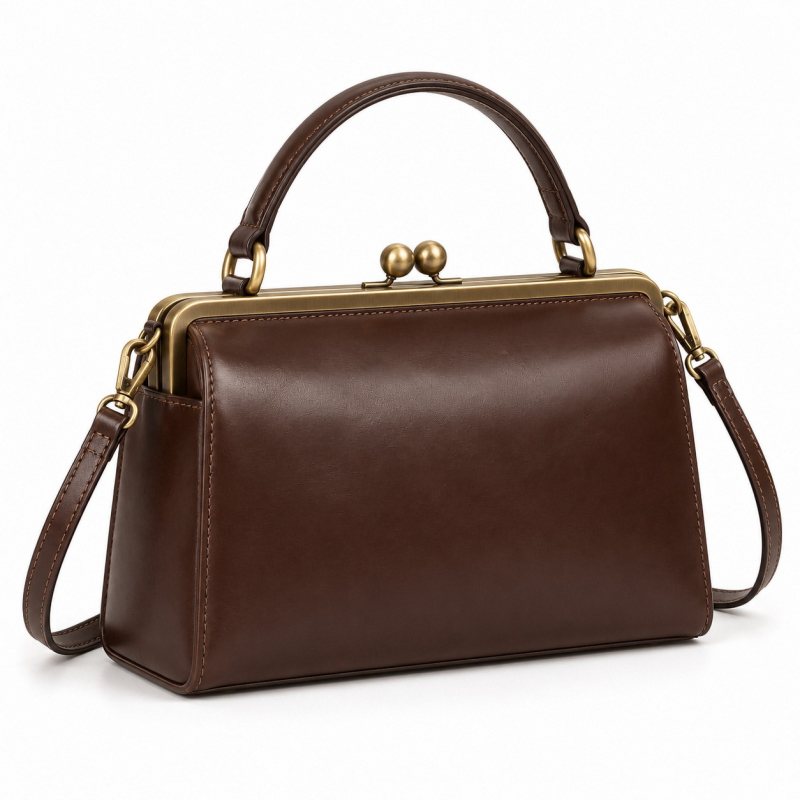 Formstabile Lederhandtasche mit Bügelverschluss - Geschlossene Tasche, Kugelverschluss und Schulterriemen